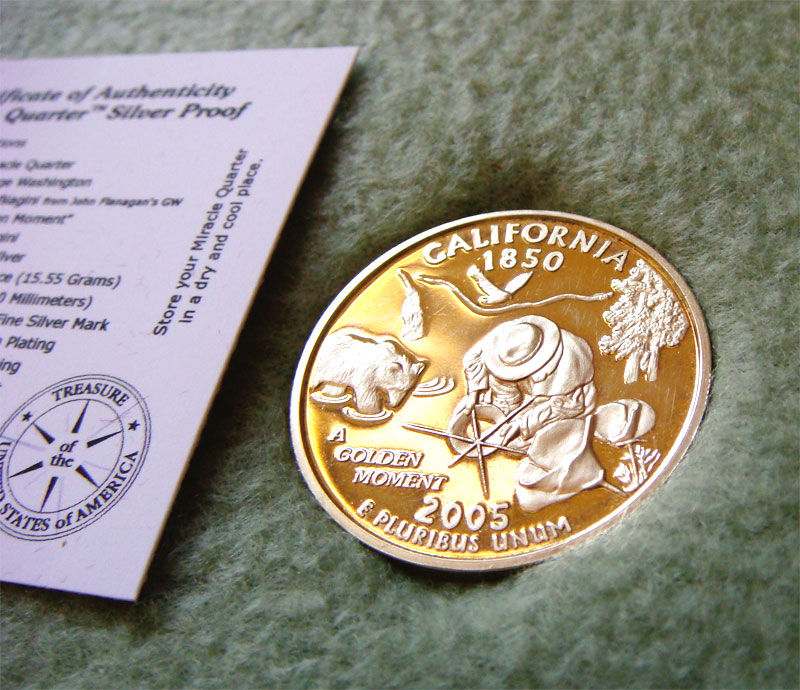 Photograph of California Quarter presented to Warren Buffett by David Biagini, featuring the design chosen by Public Election, "A Golden Moment". This particular quarter was used as a bookmark while reading Warren Buffett's book, The Snowball.
